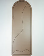 Premium non-slip yoga mat in use during a hot yoga session