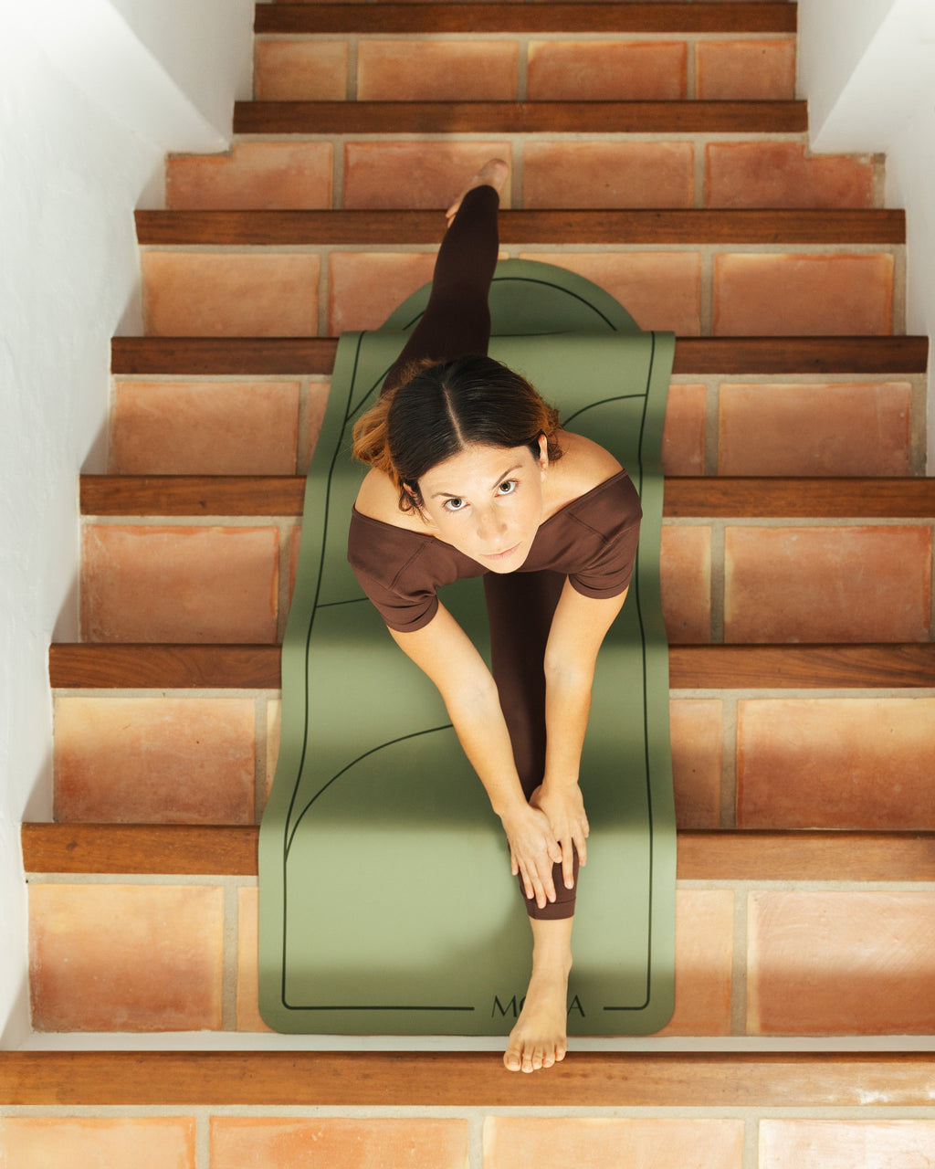 Lifestyle image of MOCA yoga mat for calm and conscious practice